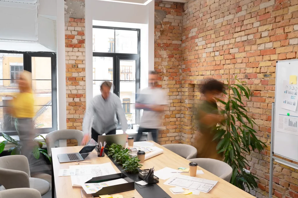Expats networking and working together in a Berlin coworking space